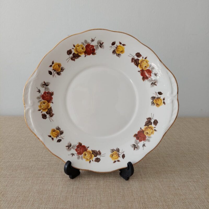 Plato galletero redondo de porcelana inglesa Colclough patrón Stratford con diseño de rosas amarillas y borde de oro de 25 cm.